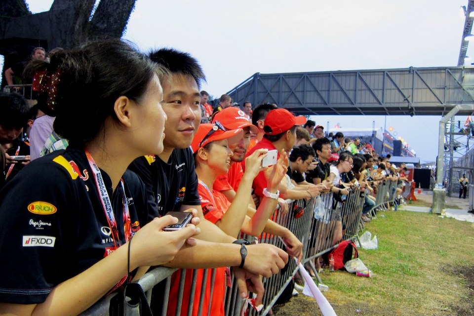 Walkabout ticket holders lining the track