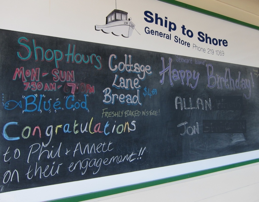 The town bulletin board outside the FourSquare store